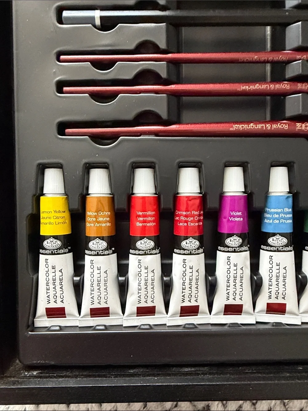 Black Artist Paint Set with Assorted Colors and Brushes